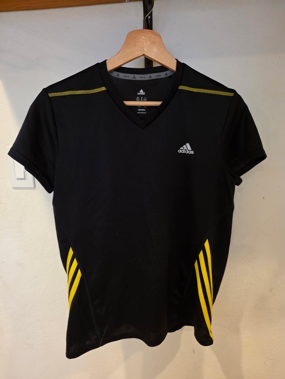 adidas Black Short-Sleeve V-Neck Performance Tee with Yellow Stripes